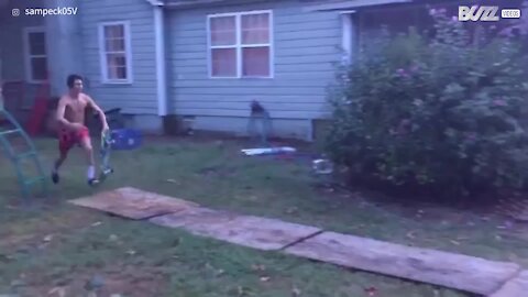 Skateboarder builds jump ramp for swimming pool