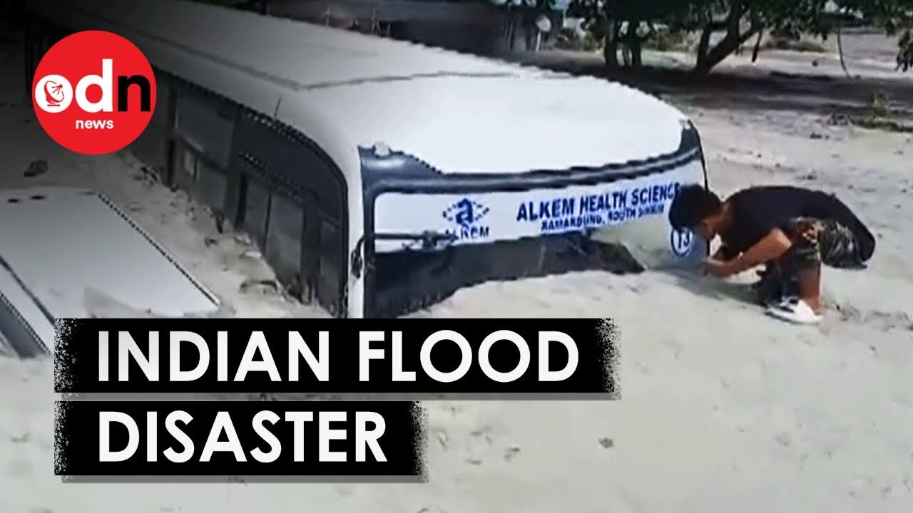 Buried in the Mud At Least 40 Dead & 100s Missing in Indian Flood Disaster