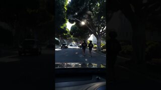 Brentwood Twins Run In Middle Of Road