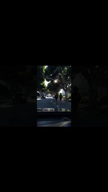 Brentwood Twins Run In Middle Of Road