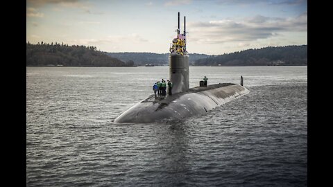 Damaged US sub in port after undersea collision in South China Sea