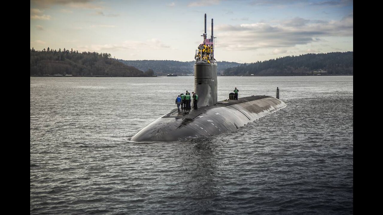 Damaged US sub in port after undersea collision in South China Sea