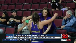 8 wrestlers medal from Kern County