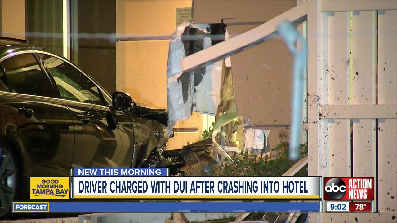 Man arrested, charged with DUI after crashing into Tampa hotel