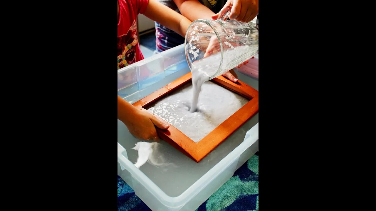 Girl Recycles Paper At Home