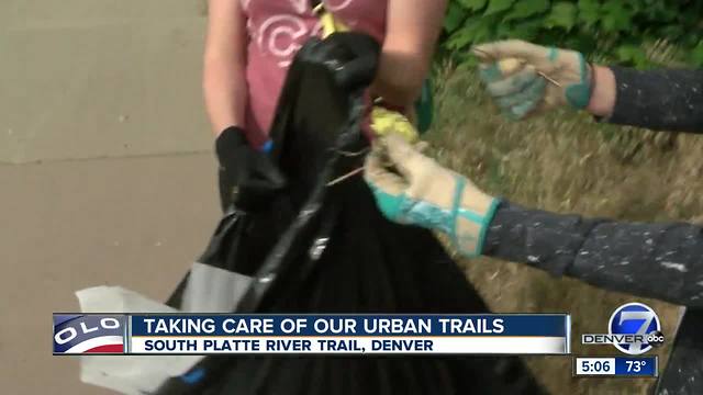 Volunteers cleanup trash on heavily populated Denver urban trails