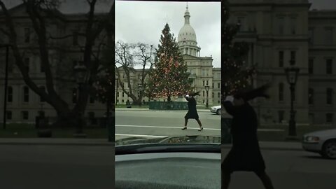 driving by christmas tree in lansing.