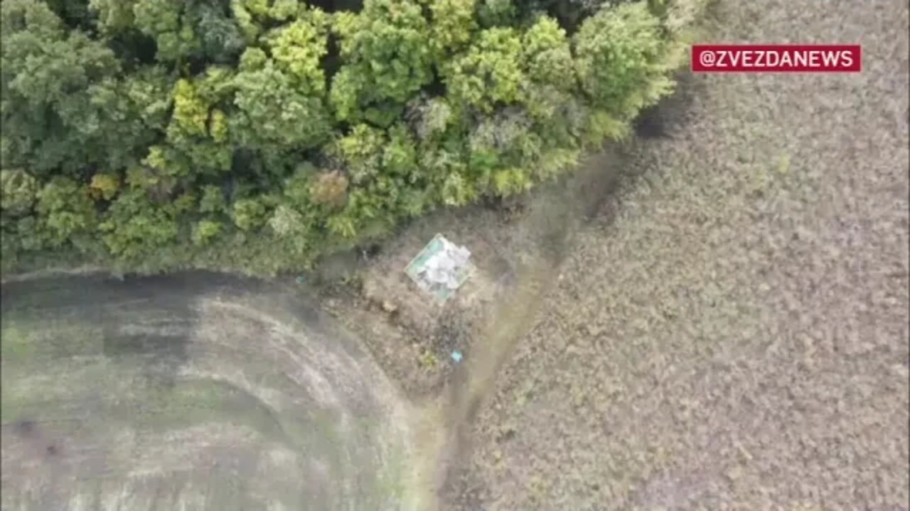 Dropping a RGD 5 grenade from a quadrocopter to a Ukrainian observation post.