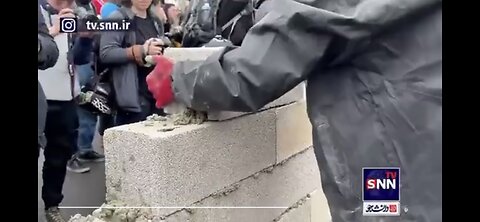 FRANCE : PROTESTERS BUILD BRICK WALL ON HIGHWAY