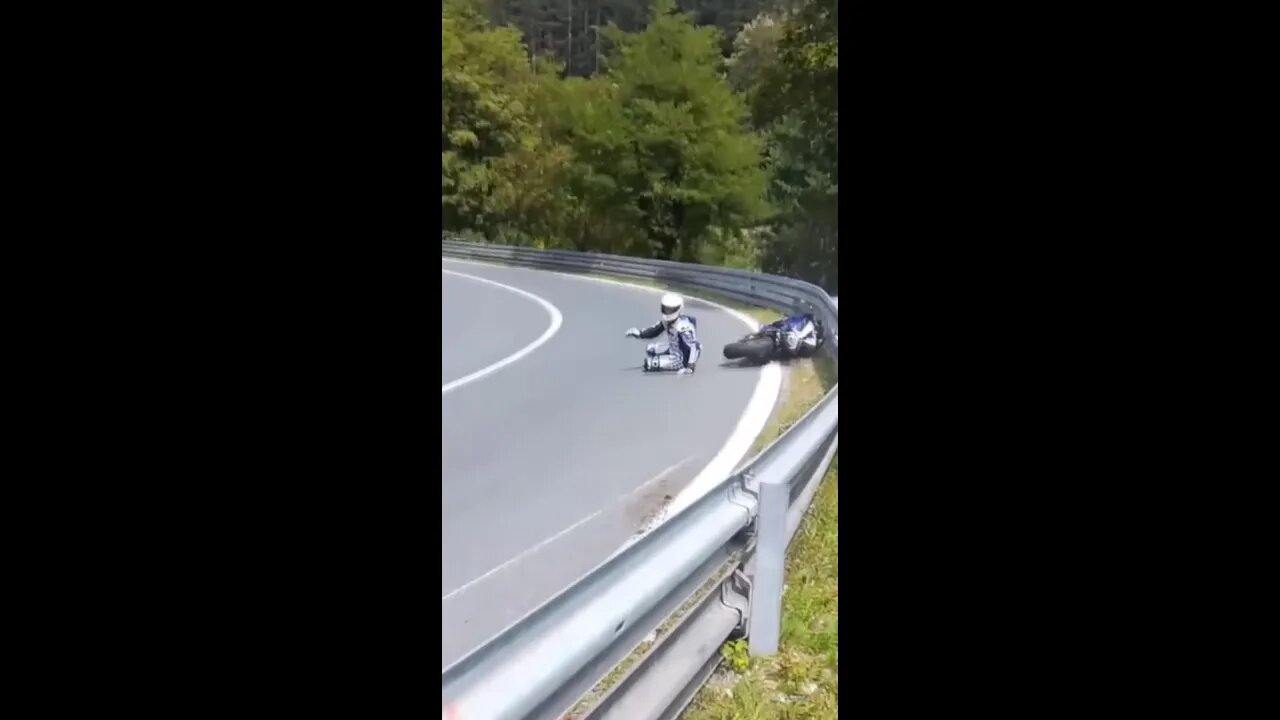 got chills watching this crash... biker got up and kept going...