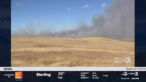 Smoke visible from the outskirts of Superior continues to billow from Boulder County wildfires