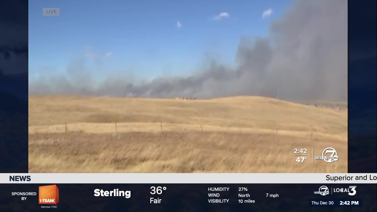 Smoke visible from the outskirts of Superior continues to billow from Boulder County wildfires