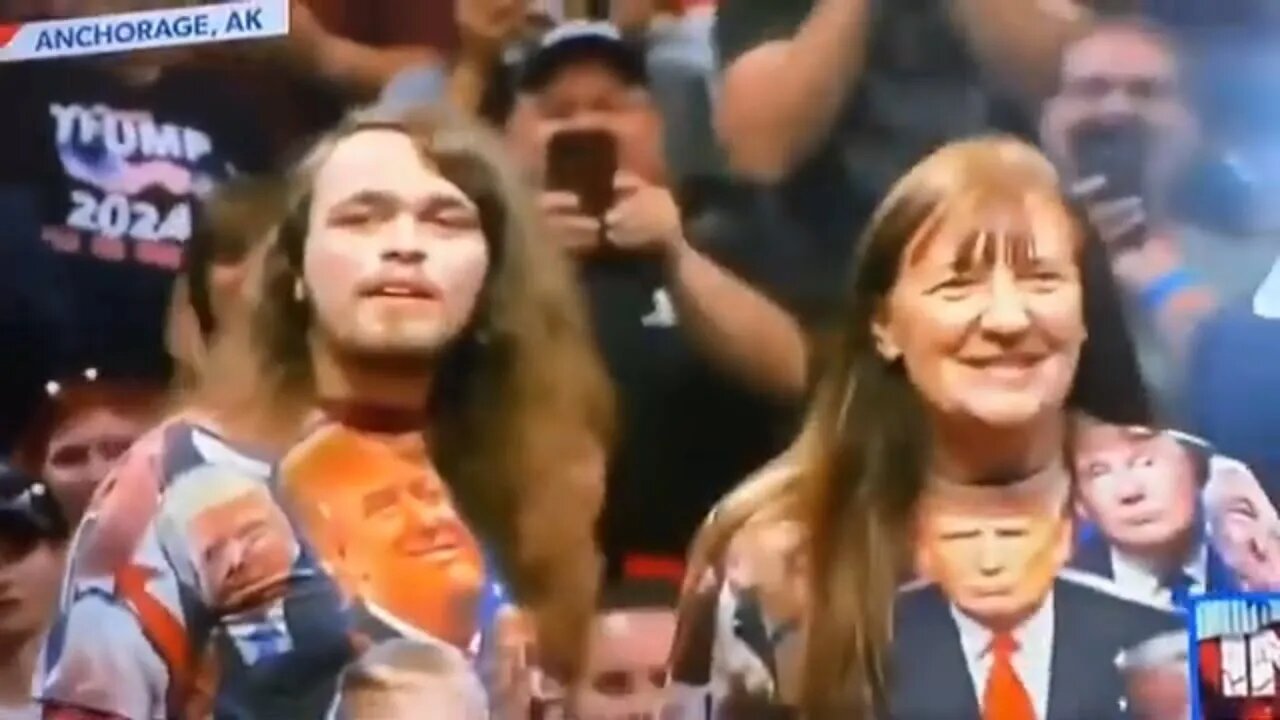 Trump rally in Alaska with two colorfull characters wearing Trump shirts