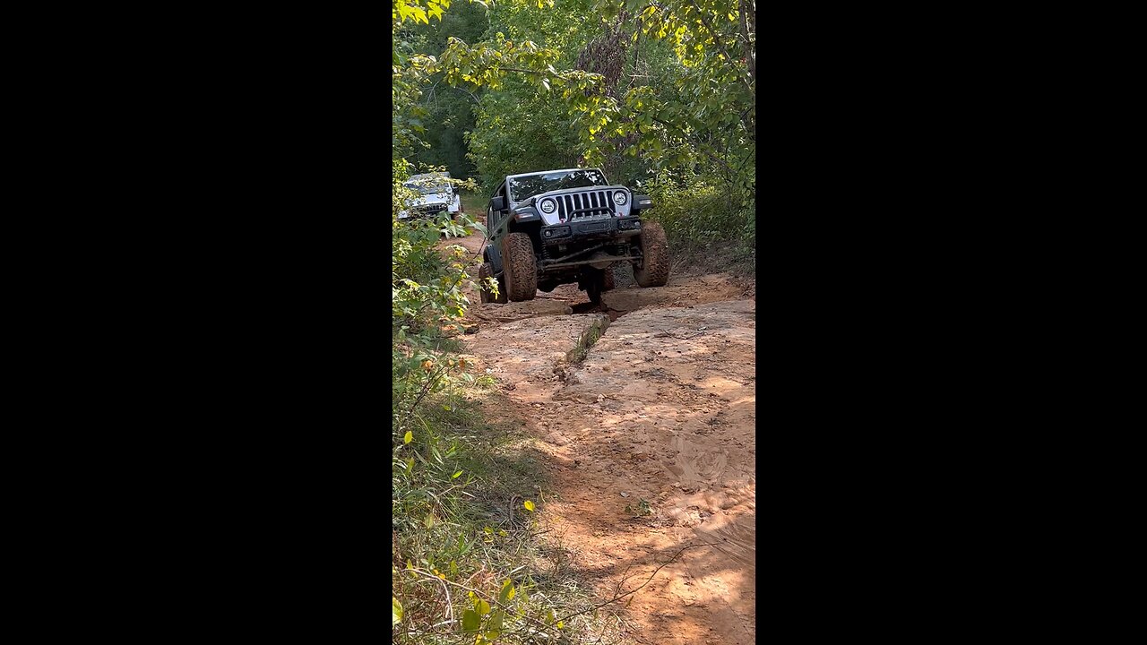 Jeep climbing cliff