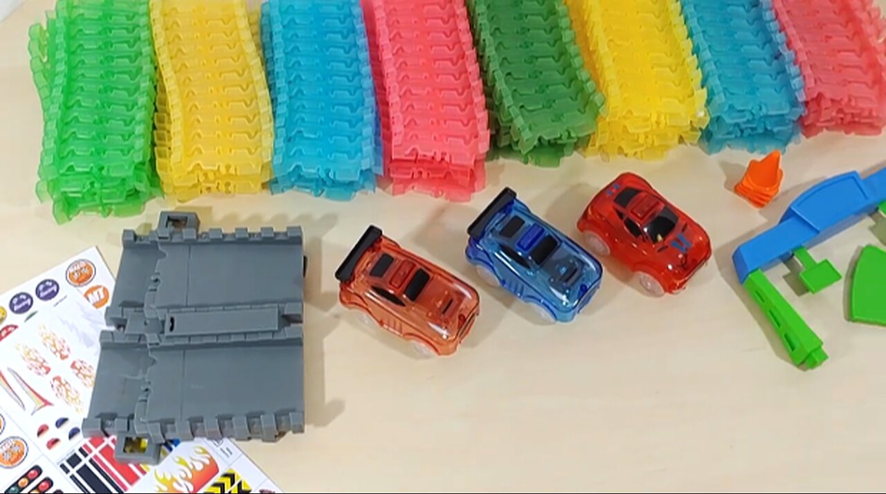 Unboxing Magic Tracks Toy Cars with cool, glowing racing cars