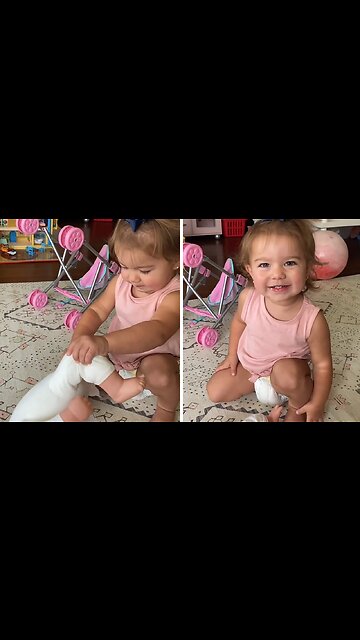 Little Girl Hilariously Gags While Changing Doll's Diaper