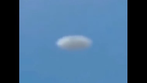 White Disc UFO Filmed from Plane over Denver