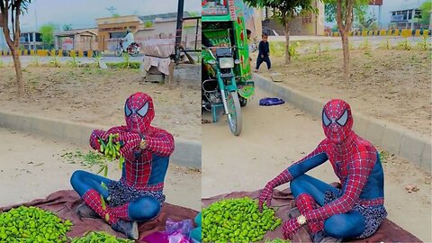 Spider Man selling vegitable on road.