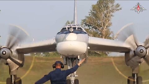 Long Range strategic bomber Tu-95MS escorted by Su-30SM and Su-35S