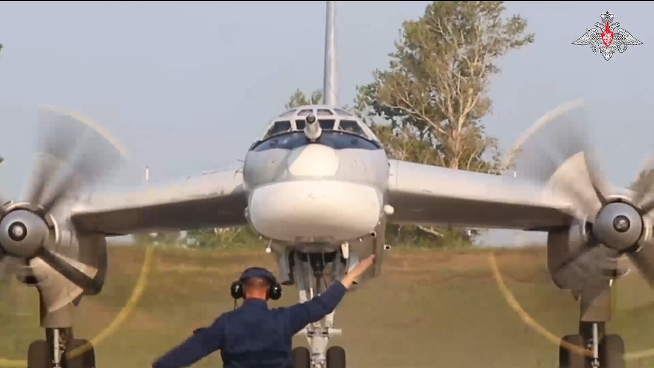 Long Range strategic bomber Tu-95MS escorted by Su-30SM and Su-35S