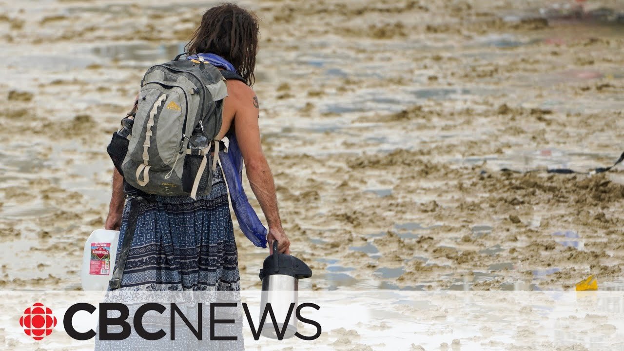 Burning Man festival: 70,000 attendees stranded and one dead after rain and flooding