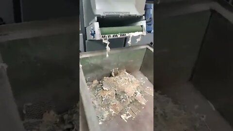 Crushing the dry damaged plates for recycling.