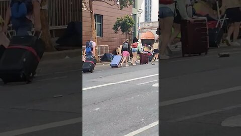 Taylor St & Ellis St, San Francisco: Tourists can't use the sidewalk as it's owned by drug users...