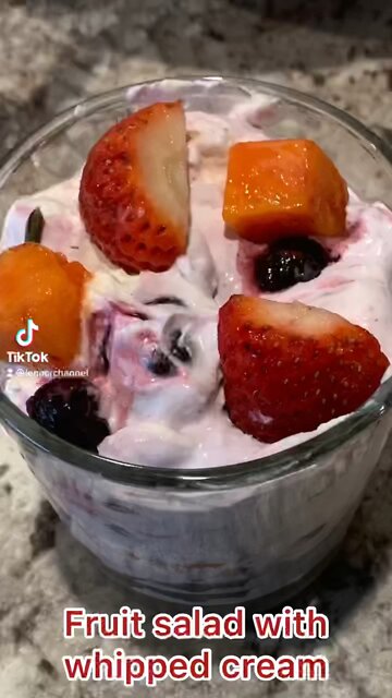 Fruit salad with whipped cream