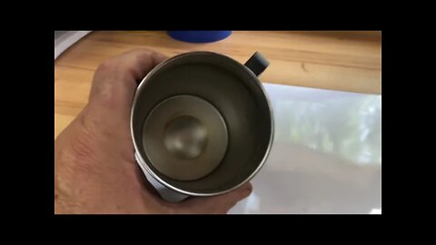 Putting synthetic handles on a knife.