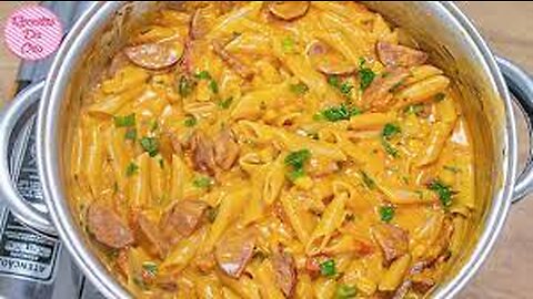 94-Macarrão cremoso com calabresa, molho de tomate, alho, cebola, creme de leite, queijo