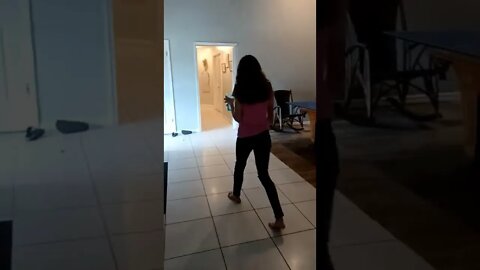 sister doing cartwheels with water