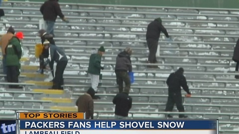 Packers fans help shovel snow