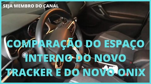 Espaço interno do Novo Tracker mostrando a frente comentando sobre bancos e comprando com do Onix!