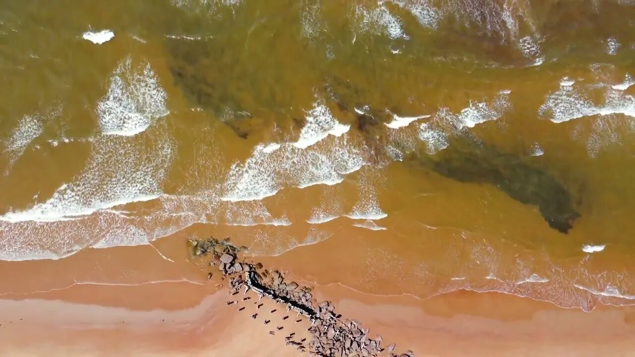 Overhead View of Waves on the Beach