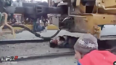 ILLEGAL ALIEN CAUGHT UNDER MOVING TRAIN!