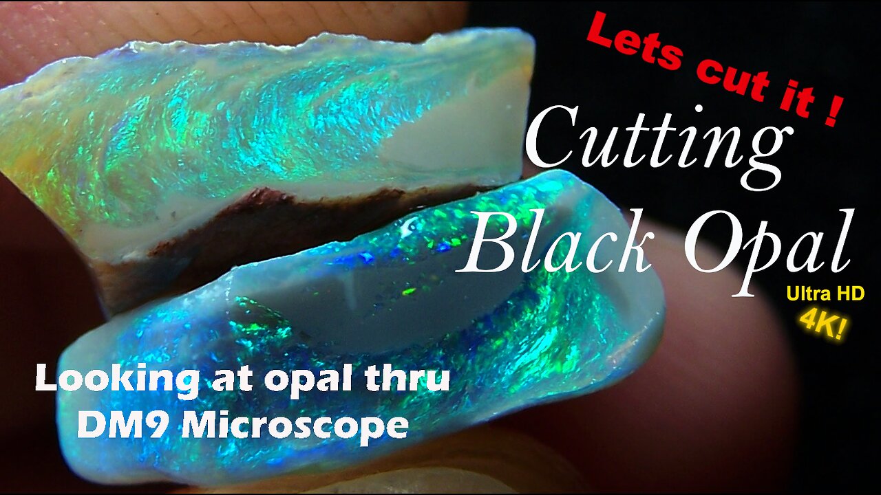 Cutting and polishing black opal rough stone to precious Gemstone Exploring opal thru microscope.