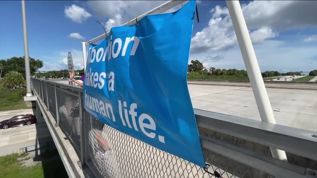 Anti-abortion group holds demonstration on I-275 overpass