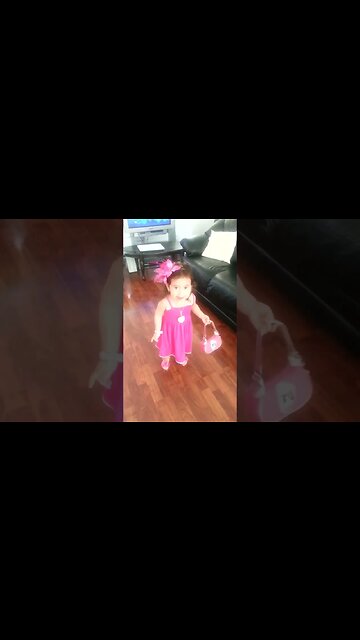 Cutie baby girl is getting ready to dance