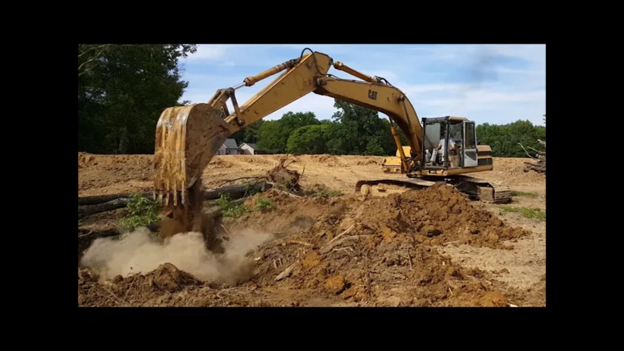 Kapper Outdoors playing on a Massive CAT Excavator, Southern Illinois land