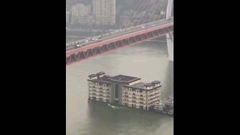 Just a full building being transported by ship in China..😯😯