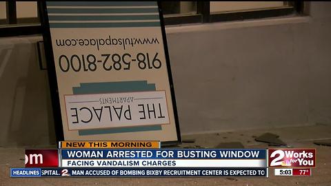 Woman arrested for busting a window at The Palace Apartments