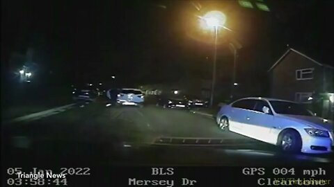 Video shows suspect dragged along road by his getaway car after police pursuit