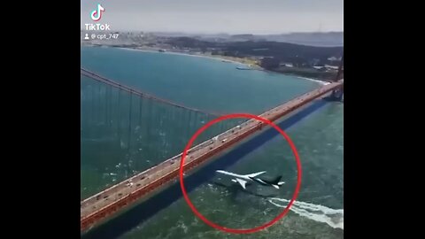 Boeing 777-300ER passing underneath the world famous the iron bridge.