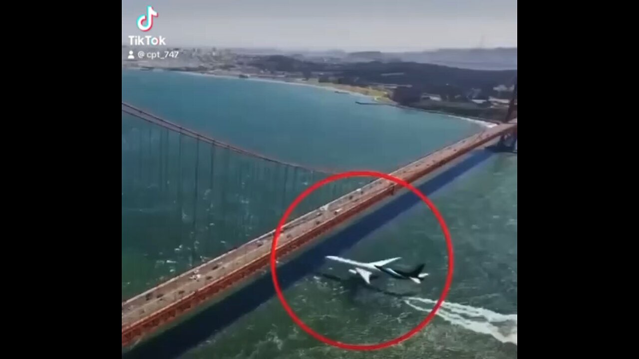 Boeing 777-300ER passing underneath the world famous the iron bridge.