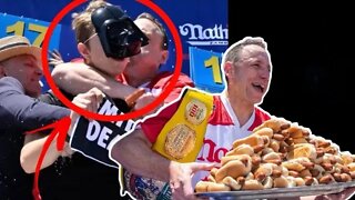 Joey Chestnut Puts Protestor In CHOKEHOLD At Nathan's Hot Dog Eating Contest, Still DOMINATES!