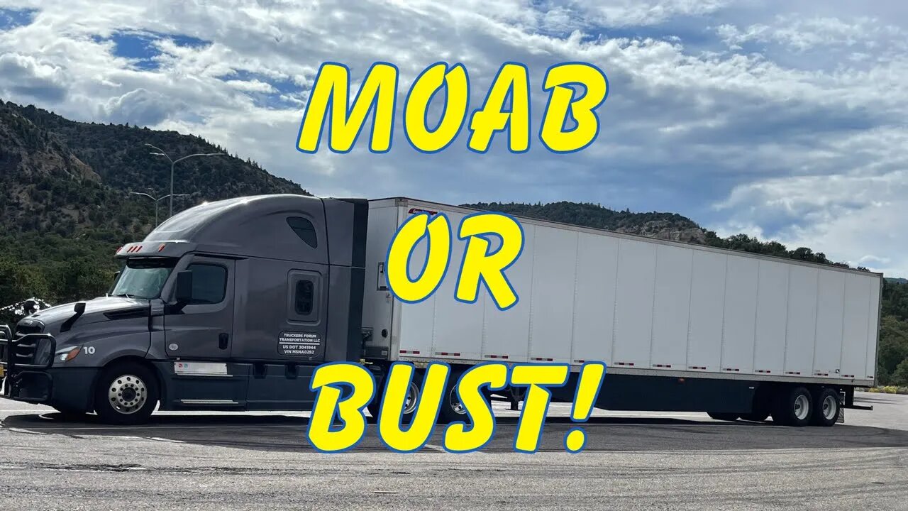 Trucking through Utah. See Moab from the windshield of a truck
