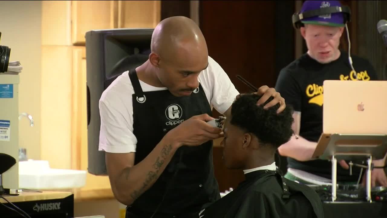 Haircuts and hard talks: Police, community hold open forum