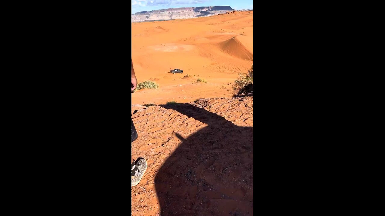 Playing in the sand below Top Of The World