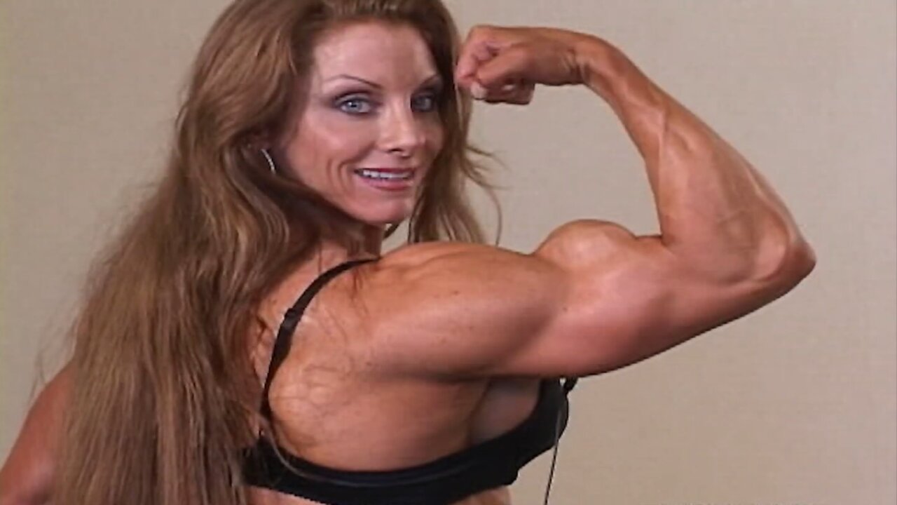 Lindsay Mulinazzi Flexing Sculpted Bicep Peaks