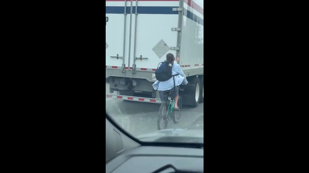 Cyclist Riding On Highway